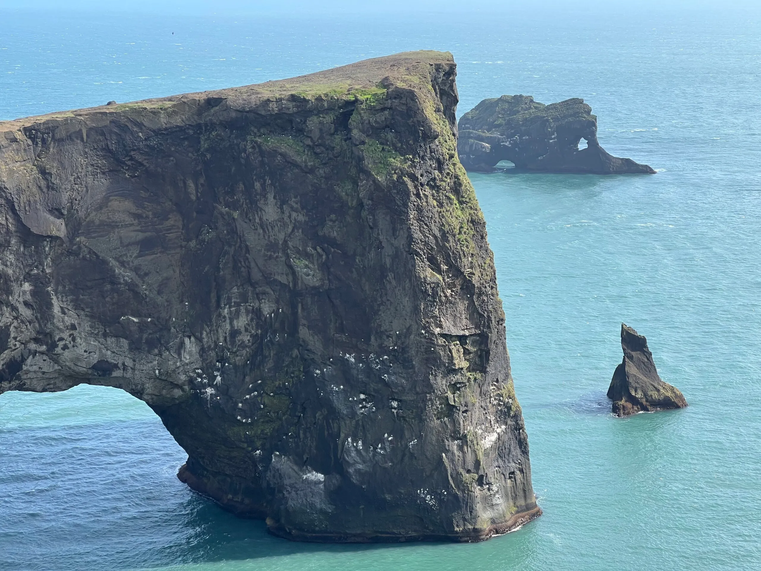 Striking rock formation dropping into the Ocean along the south coast of Iceland