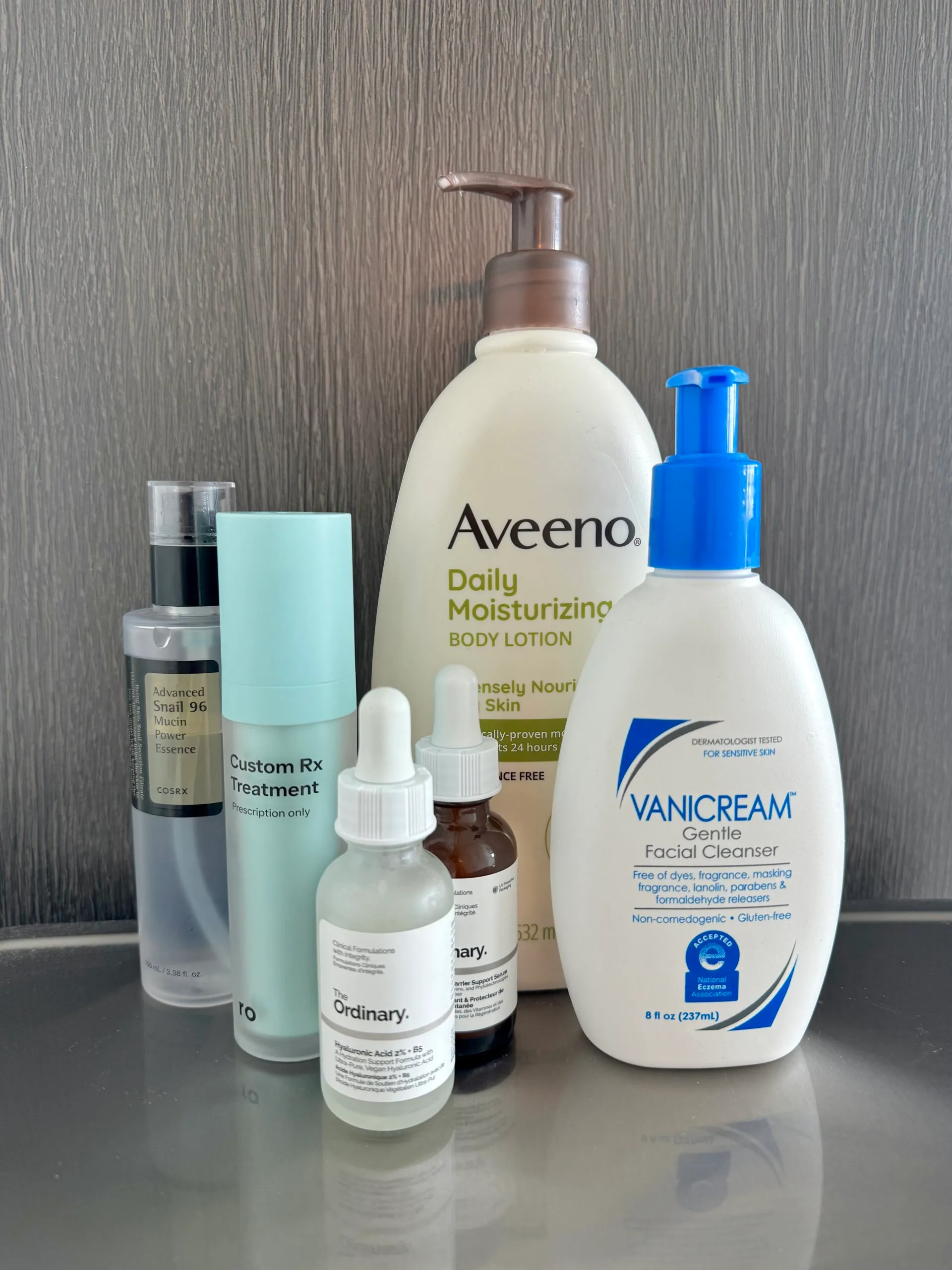 Collection of skincare products for flying